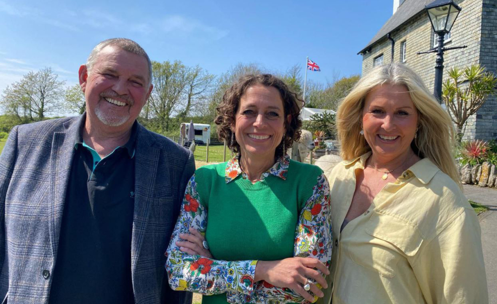 Neal, Alex Polizzi and Tracey in front of St Anne's House